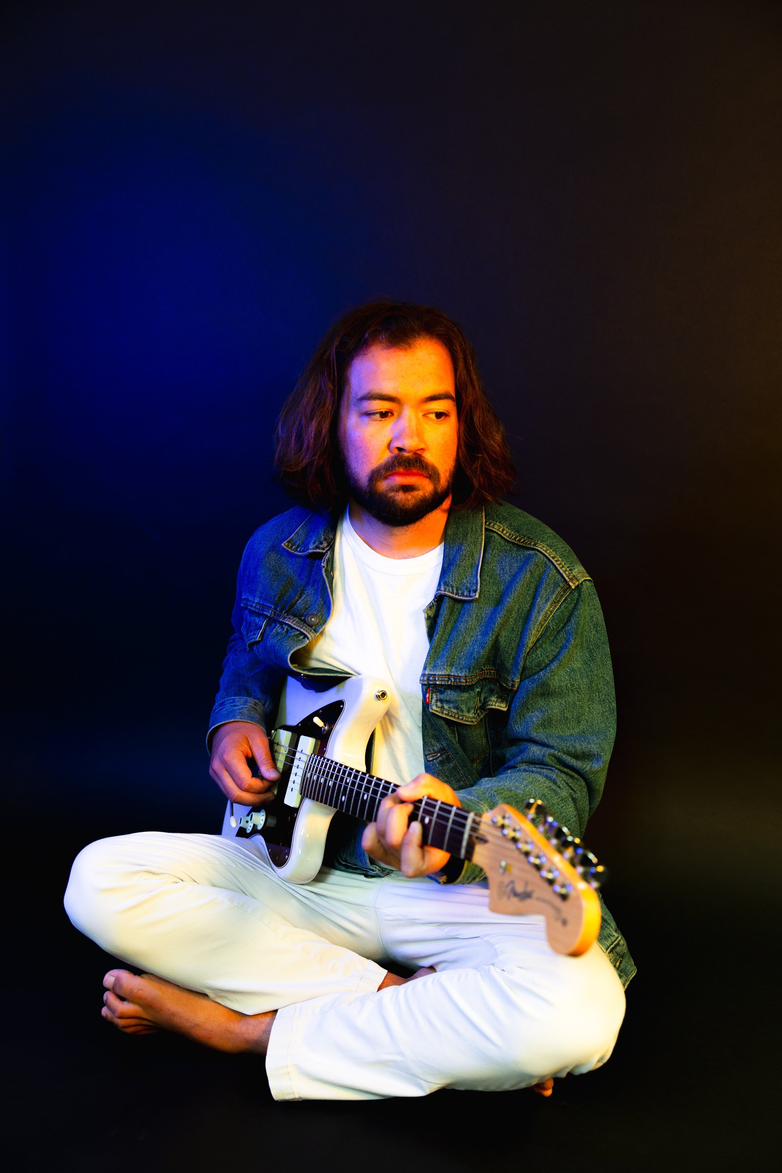 Alec Boyd playing guitar